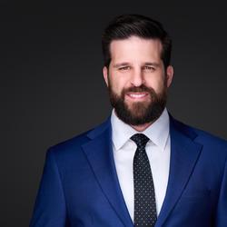 Ryan E. Kreda